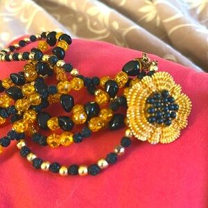 Triple Strand Gold, Black, Carved Rose Beads, Amber Colored and Gold Clasp